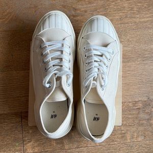 Brand new Canvas white sneakers, never worn from H&M.